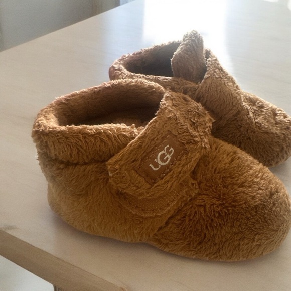 The UGG™ Kids Bixbee booties. - Picture 1 of 7